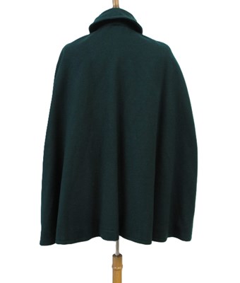 Lot 22 - A 1960's nurses cape, in green wool with red...