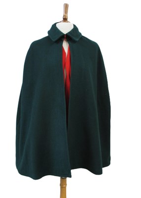 Lot 22 - A 1960's nurses cape, in green wool with red...