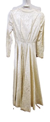 Lot 23 - A 1940's cream patterned satin wedding...
