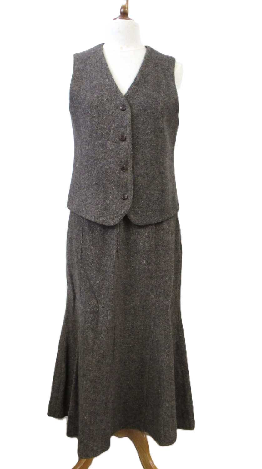 Lot 92 - Orvis: a brown wool tweed calf length skirt...