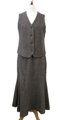 Lot 92 - Orvis: a brown wool tweed calf length skirt...
