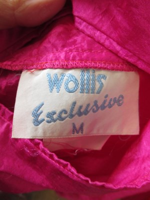 Lot 61 - Two 1980's duster coats, including a fuschia...
