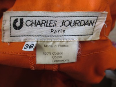 Lot 61 - Two 1980's duster coats, including a fuschia...