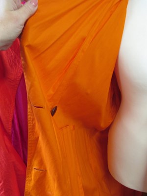 Lot 61 - Two 1980's duster coats, including a fuschia...