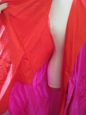 Lot 61 - Two 1980's duster coats, including a fuschia...