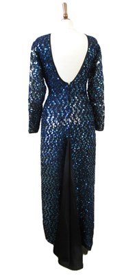 Lot 57 - John Charles: a blue sequin dress, with deep...