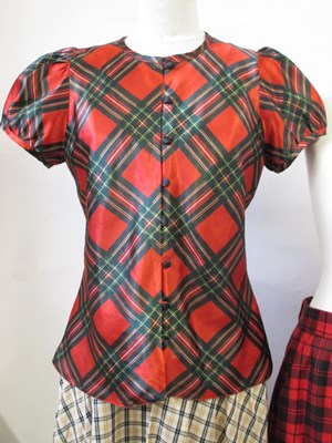 Lot 86 - A tartan pleated skirty by Jobis (estimated...