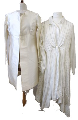 Lot 114 - A cream satin jacket by Ben DeLisi, with hook...