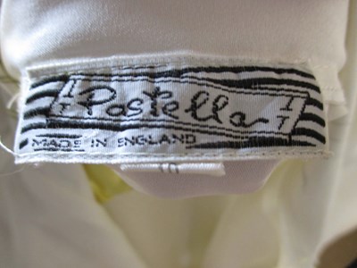 Lot 90 - A cream printed pussy bow blouse by Pastella...