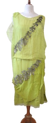 Lot 7 - A 1920's beaded dress, the double...