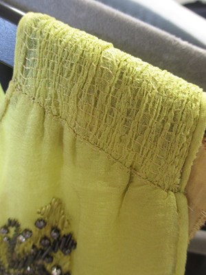 Lot 7 - A 1920's beaded dress, the double layer...