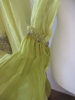 Lot 7 - A 1920's beaded dress, the double layer...
