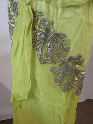 Lot 7 - A 1920's beaded dress, the double layer...