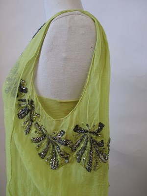 Lot 7 - A 1920's beaded dress, the double layer...