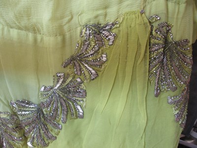 Lot 7 - A 1920's beaded dress, the double layer...