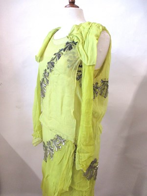 Lot 7 - A 1920's beaded dress, the double layer...