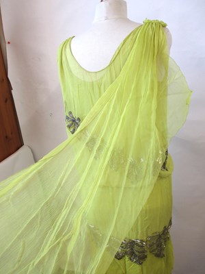 Lot 7 - A 1920's beaded dress, the double layer...