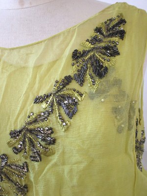Lot 7 - A 1920's beaded dress, the double layer...