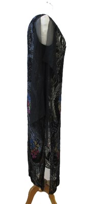 Lot 8 - A 1920's beaded dress, in fine black net with...