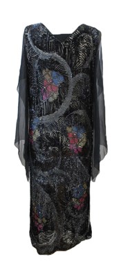 Lot 8 - A 1920's beaded dress, in fine black net with...