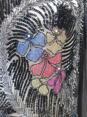 Lot 8 - A 1920's beaded dress, in fine black net with...