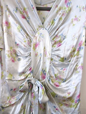 Lot 11 - A 1930's floral satin dress, with central...