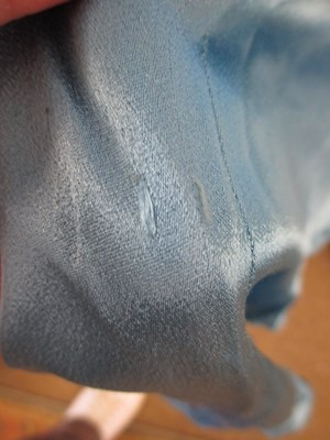 Lot 10 - A 1930's blue satin dress, with rounded...