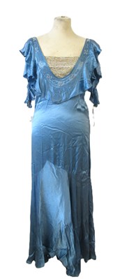 Lot 10 - A 1930's blue satin dress, with rounded...