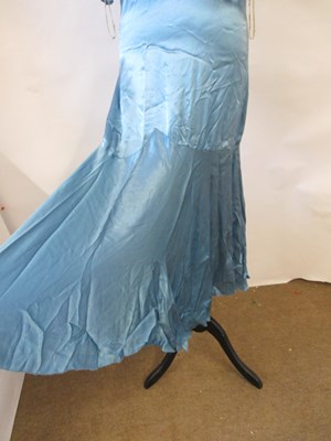 Lot 10 - A 1930's blue satin dress, with rounded...