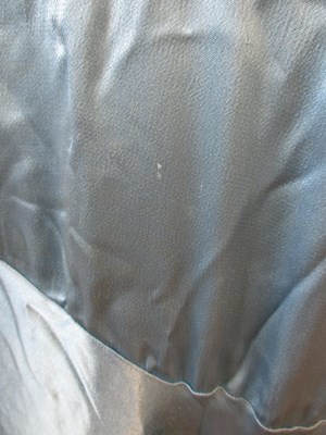 Lot 10 - A 1930's blue satin dress, with rounded...