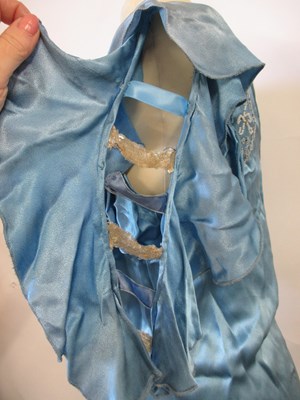 Lot 10 - A 1930's blue satin dress, with rounded...