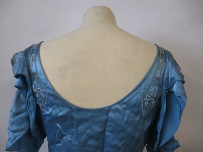 Lot 10 - A 1930's blue satin dress, with rounded...