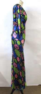 Lot 12 - A 1930's floral satin dress, with rounded...