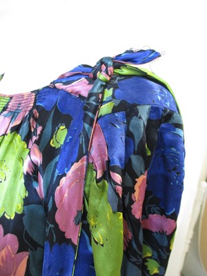 Lot 12 - A 1930's floral satin dress, with rounded...