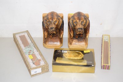 Lot 42 - A pair of plasterwork dogs head bookends...