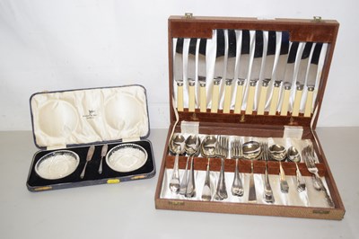 Lot 51 - A canteen of stainless steel cutlery together...
