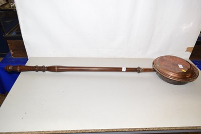 Lot 74 - A copper bed warming pan