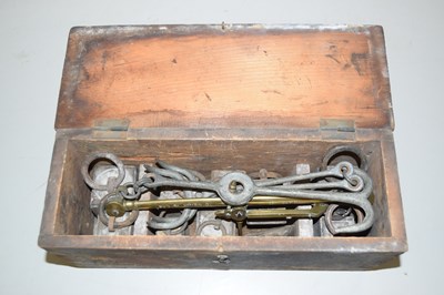 Lot 83 - A brass and steel beam scale, a box of iron...