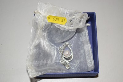 Lot 113 - A Swarovski pendant and chain