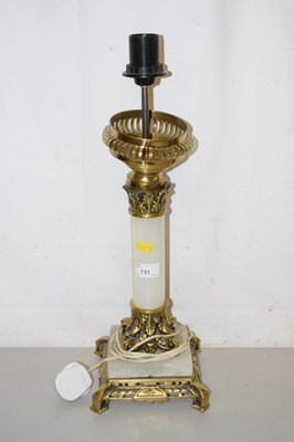 Lot 131 - A brass and alabaster table lamp
