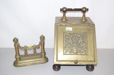 Lot 182 - A brass coal scuttle and fire dog