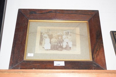 Lot 206 - A vintage family portrait photograph set in a...