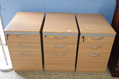 Lot 211 - Set of three modern light wood finish office...