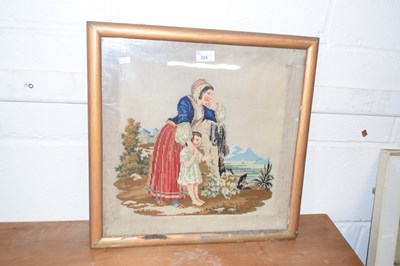 Lot 225 - A Victorian tapestry picture of mother and child