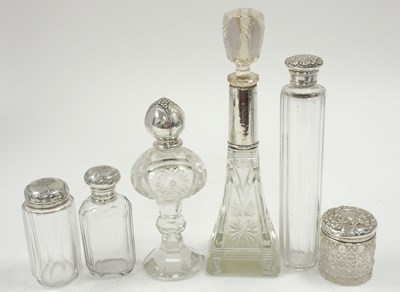 Lot 153 - Mixed Lot:  A group of five glass bottles with...