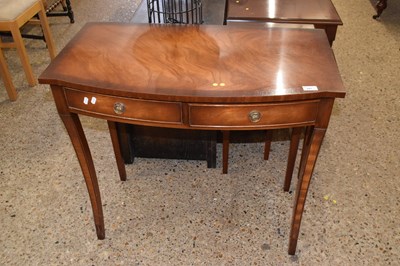 Lot 261 - A reproduction mahogany bow front two drawer...