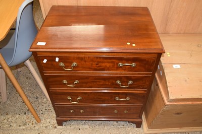 Lot 265 - A reproduction mahogany four drawer chest