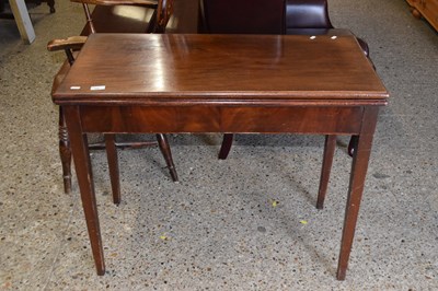 Lot 269 - A Georgian mahogany tea table with foldover top