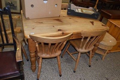 Lot 280 - A 20th Century pine kitchen table with five...