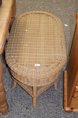 Lot 283 - A wicker coffee table
